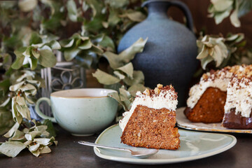 Homemade chocolate cake with whipped cream and walnuts