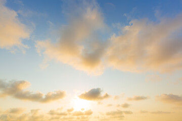 Golden sky and clouds,Beautiful , luxury soft gradient orange gold clouds and sunlight on the blue sky perfect for the background, take in everning,Twilight, Large size, high definition landscape phot