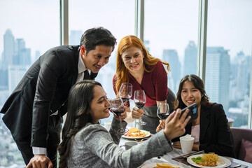 Group of diversity people are celebrating at luxury restaurant.