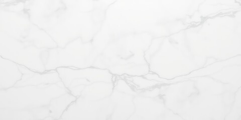Obraz premium High-resolution image of a clean white marble surface with subtle grey veining, ideal for backgrounds and design projects.