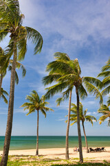 Obraz premium Sonasea Beach, Phu Quoc, Vietnam - November 26th 2024: Coastal Resort Scenery of Phu Quoc Island in Vietnam. A Tropical Tourism Destination for Summer Vacation in Southeast Asia. On a beautiful day.