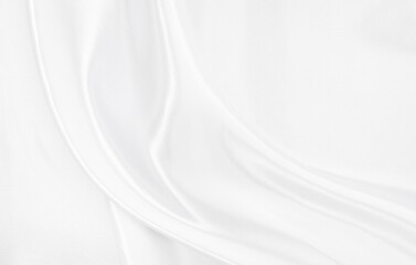 White gray satin texture that is white silver fabric silk background with beautiful soft blur...