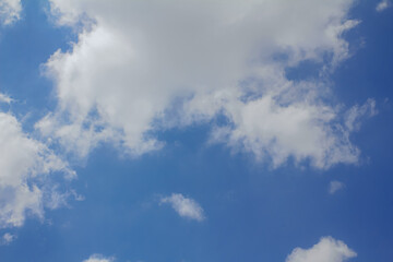 Bright Blue Sky with Puffy White Clouds