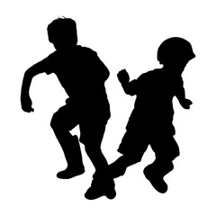 Silhouette of Two Children Running and Playing Outdoors