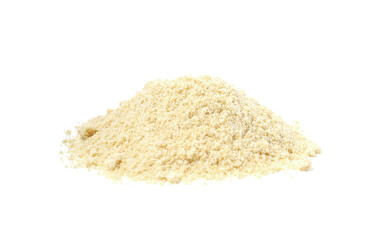 Superfood product. Pile of sesame seeds powder isolated on white