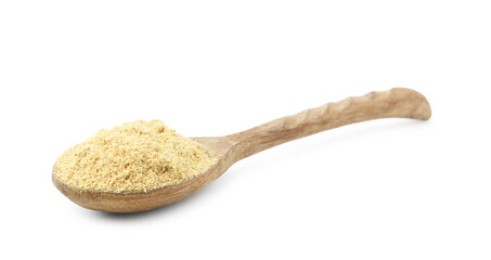Superfood. Mustard powder in spoon isolated on white