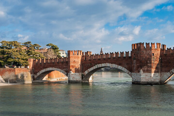 Fototapeta premium Aerial view of Verona with its beautiful bridges crossing the river Adige