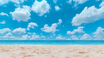 Fototapeta premium Beach with Blue Sky and White Clouds Above Ocean Water