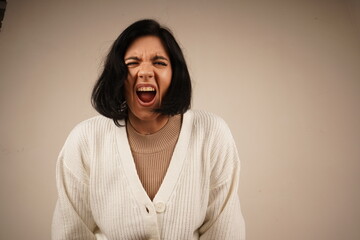 The body language emphasizes the element of unpredictability of the moment. With arms spread out to...