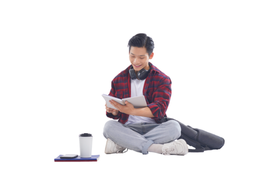 portrait of asian male student sitting posing on white background