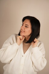 Clenched fists convey determination and readiness for self-defense. The gesture exudes strength and...
