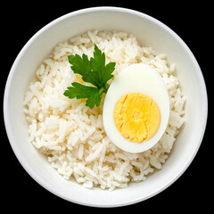 A bowl of warm rice with a hard-boiled egg. Isolated on black background.