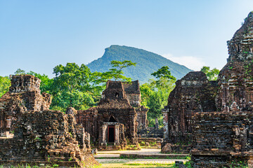 Group of buildings with a mountain in the background