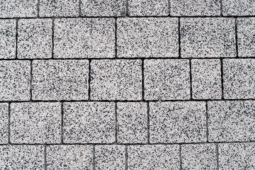 Close-up background texture of gray paving slabs.