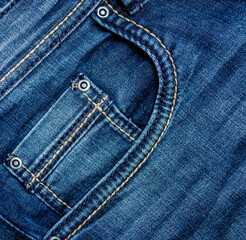 Close-up of a pocket on jeans with buttons