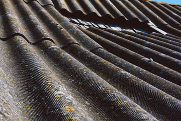 Close-up. Old corrugated slate roof background.