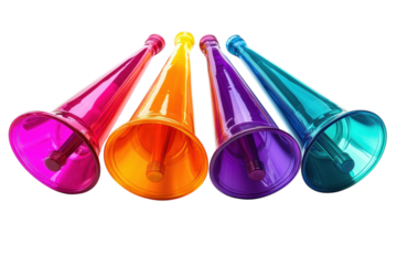 Vibrant rainbow colored plastic party horns ready for a celebration against a black background on transparent background