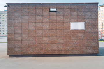 Background construction of a modern transformer substation building.
