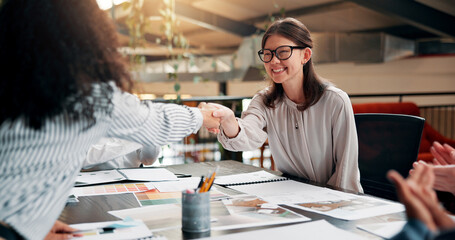 Interior designer, people or handshake with partnership in office for renovation contract, deal or b2b onboarding. Applause, documents or client with celebration for design proposal approval or offer