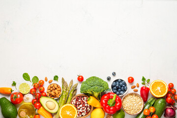 Healthy food assortment on white background.