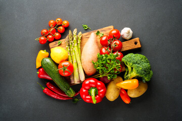 Fresh vegetables on black background