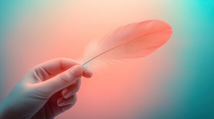 Delicate feather held in a gloved hand, vibrant colors.