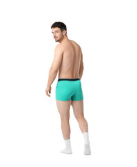 Fototapeta premium Young man in stylish turquoise underwear on white background