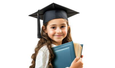 Portrait of a smiling young school graduate wearing a graduation cap, isolated on transparent background