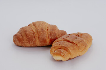 Croissant. Delicious pastry of French cuisine baked in the oven, isolated on white background.