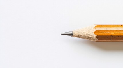 Fototapeta premium Close-up of a sharpened pencil tip on a white background