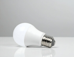 A simple white background with an isolated light bulb symbolizing creativity, innovation, and energy