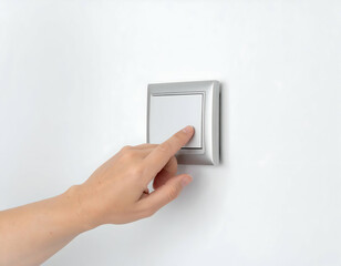 Hand turning off a white light switch on wall to save energy