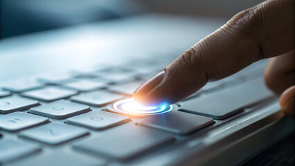 Finger pressing glowing button keyboard, symbolizing launch of virtual application or technology. moment captures excitement