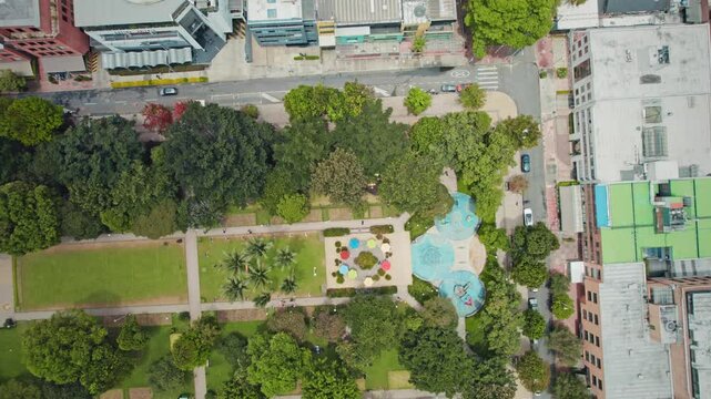 Aerial Top View of City Park with Playground and Trees - Parque de la 93, Bogot&aacute;, Colombia