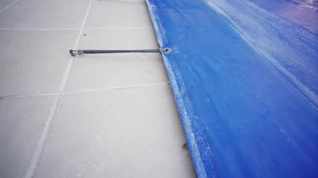 The pool cover has winterized the in ground pool