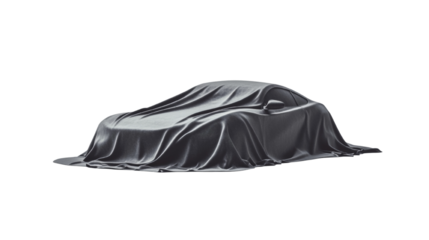 Unveiling the future: sleek automobile silhouette shrouded in satin sheet