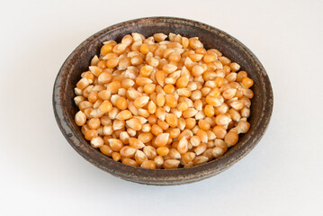 Unpopped Yellow Popping Kernels in a Bowl