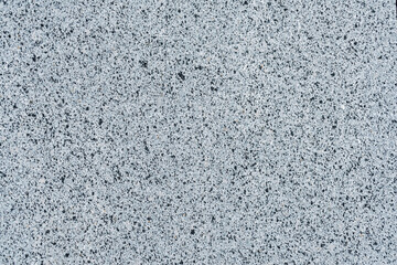 Close up seamless texture of gray granite background.