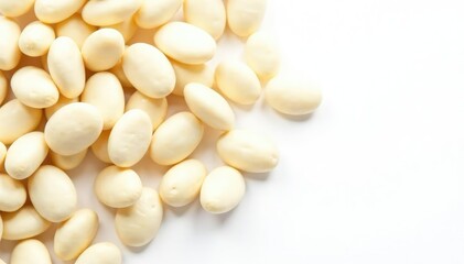 Scattered white beans on pure white background, nature, vegetarian