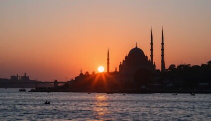 Obraz premium Sunset Silhouette of the Ortak?y Mosque in Istanbul, Turkey