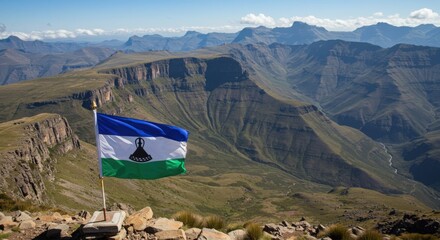 Waving Basotho Flag Symbolizing Mountain Kingdom Peace Over the High-Altitude Drakensberg Ranges