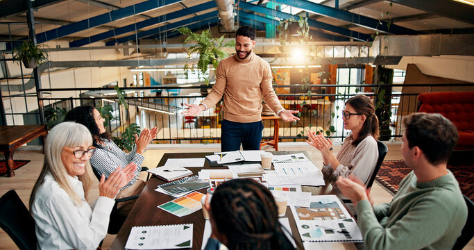 Creative paperwork, people and clapping in meeting for campaign recognition, KPI goals and branding approval. Design agency, above and team applause for marketing pitch success and project management