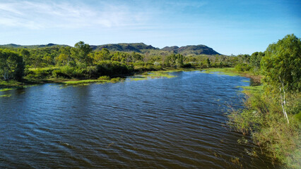 Fototapeta premium Australian remote bushland with it´s vegetation and a lake, seen from above
