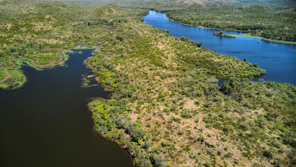 Australian remote bushland with it´s vegetation and a lake, seen from above