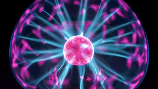 Plasma globe or lightning plasma ball - plasma lamp with noble gas inside with filaments extending from inner sphere to outer, also works as an ionizer. Slow Motion video