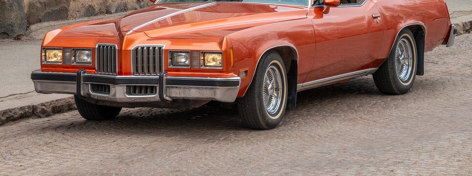 Retro car. Front part, side view.