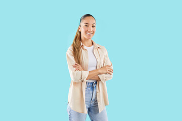 Happy confident sure attractive woman in casual wear, standing arms crossed, friendly smiling,...