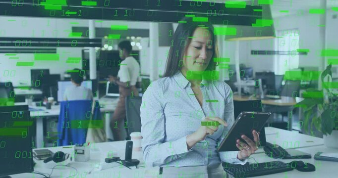 Mid-adult woman using tablet at open-plan office, with floating binary code overlay showing tech