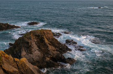 Waves Crashing Against Rugged Cliffs on the Cornwall Coast