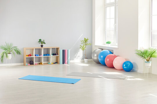 Empty room filled with equipment in a physiotherapy and rehabilitation center, clinic, or hospital office. This space is designed for therapy and sport activities to aid patient recovery.